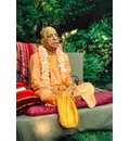 Prabhupada Outside on Vyasasana on Grass with Big Beadbag