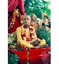 Prabhupada at New Vrindavan Sitting on Vyasasana Outside