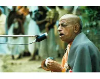 Srila Prabhupada Leads Kirtan Outside Sitting on Grass