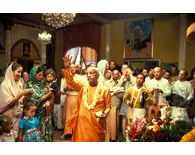 Srila Prabhupada Sprinkles Water from Conchshell