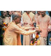 Srila Prabhupada offers a Flower Garland to Sri Sri Radha Paris-Isvara