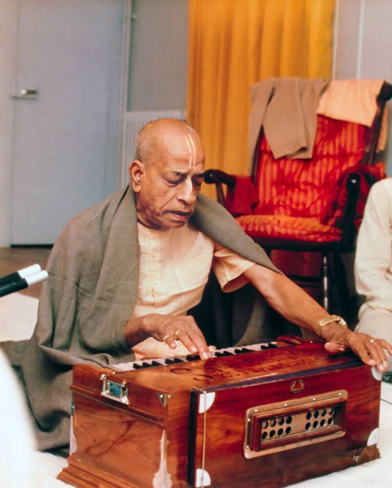 Srila Prabhupada Playing Harmonium