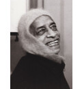 Srila Prabhupada wearing swami hat and smiling