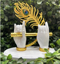 Krishna's Hand With Flute And Peacock Feather